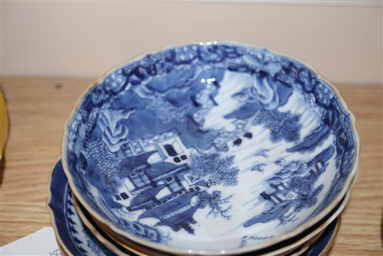 A group of 18th/19th century Chinese famille rose and blue and white saucers dishes tallest 23cm